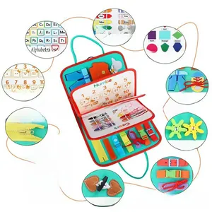 Detail view of Montessori busy board with alphabet, numbers, and motor skill learning buckles