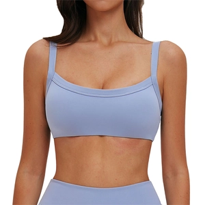 Reggiseno sportivo azzurro con spalline larghe e scollo liscio per lo yoga
