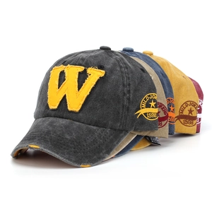 Distressed washed cotton baseball caps with W embroidery in multiple vintage colors