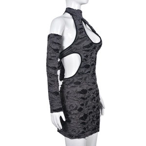 Close-up of distressed grey mini dress featuring cutout details and matching sleeves