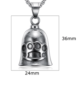 Detailed view of punk style guardian bell pendant with brass knuckles design 36mm x 24mm