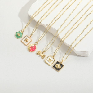 Detailed view of assorted creative game controller and enamel pendants on gold chains