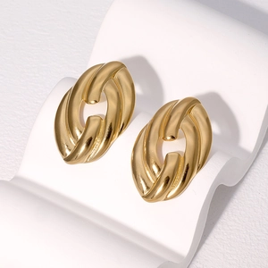 Polished 18k gold plated stainless steel twisted oval hoop earrings on a wave display
