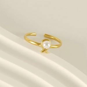 Elegant gold titanium steel open ring with a single white pearl in a minimalist design