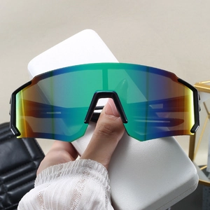 Detail of colorful gradient mirror lens on professional cycling sports sunglasses