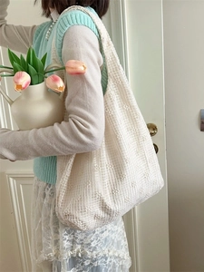 Elegant white floral mesh tote bag for women with delicate lace crochet texture