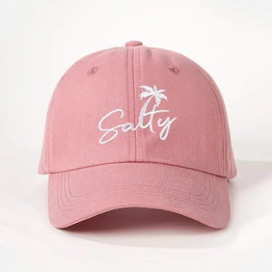 Pink cotton baseball cap with Salty embroidery and palm tree design in front view
