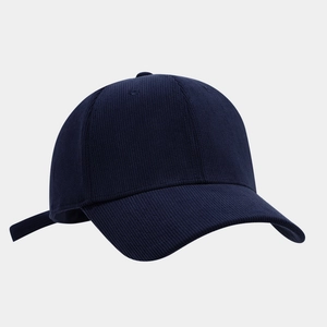Detail of navy blue corduroy texture and six-panel stitching on this vintage baseball cap