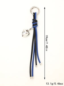 Detail view of woven leather keychain with heart pendant and dimensions 19cm 13.1g