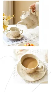 Service à thé vintage en céramique avec motifs floraux et pois peints à la main