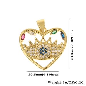 Detailed view of heart-shaped evil eye pendant with multicolored crystal inlay