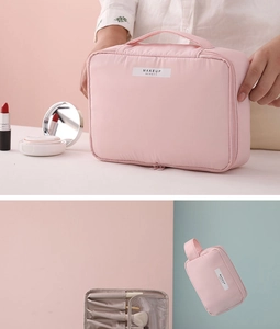 Pink waterproof makeup bag set showing portable handle design and large storage capacity