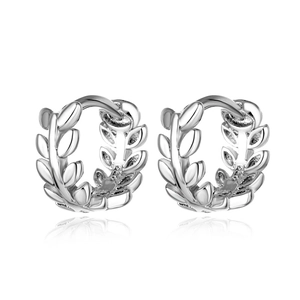 Silver branch laurel leaf huggie earrings with a polished finish and mirror reflection