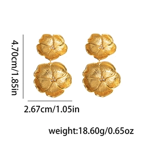 Detailed size view of gold flower earrings with dimensions 4.70cm by 2.67cm