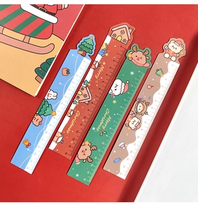 Set of four 15cm Christmas magnetic rulers with cartoon deer and Santa on red background