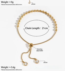 Adjustable gold bead bracelet featuring 21cm chain length and zircon charms on white backdrop