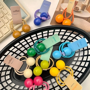 Colorful elastic double ball hair ties for girls in various pastel shades and resin spheres
