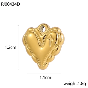 Detailed view of heart-shaped gold pendant with star engraving and 1.2cm size marks