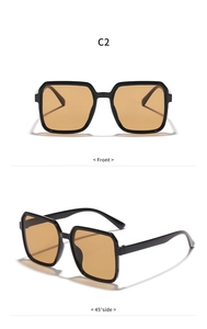 Front- und 45-Grad-Seitenansicht der schwarzen quadratischen Sonnenbrille mit orangen Gläsern