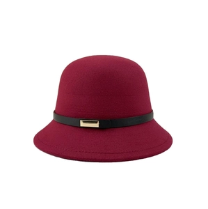 Elegant burgundy wool cloche hat with black leather strap and gold buckle for women
