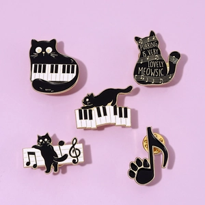 Detailed set of 5 black cat music enamel pins with piano keys and musical notes