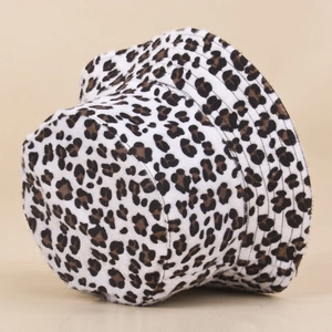 Stylish leopard print faux fur bucket hat with soft plush texture for autumn travel