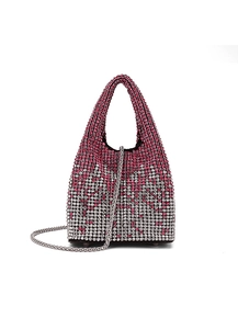 Detailed shot of pink and silver gradient rhinestones on a luxury evening bucket bag