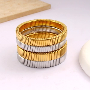 Textured Tubogas stretch bangles in gold and silver finish minimalist titanium steel cuffs