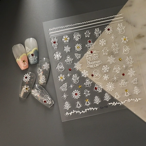5D embossed Christmas nail stickers featuring Santa and snowflake designs with rhinestones