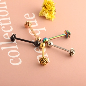 Detailed view of 3D rose flower tongue barbells in five different metallic finishes