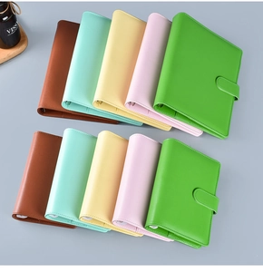 Detailed top view of assorted Macaron PU leather loose-leaf notebooks with snap closures