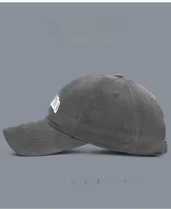Detail view of cotton twill baseball cap with 3D embroidery and adjustable strap