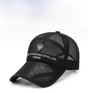 Close-up of black mesh trucker hat featuring embroidered S SPORTS shield logo and stylish text