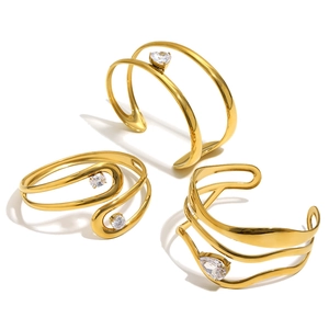 Polished 18K gold-plated stainless steel open bracelets with teardrop zircon stones
