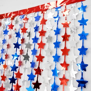 Detail of 2M metallic foil fringe curtain with red blue and silver stars for party decor