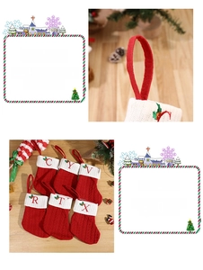 Close-up of red knitted Christmas stocking featuring white faux fur cuff and red letter embroidery