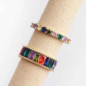 Adjustable gold plated rings featuring vibrant multi-color cubic zirconia rainbow stones
