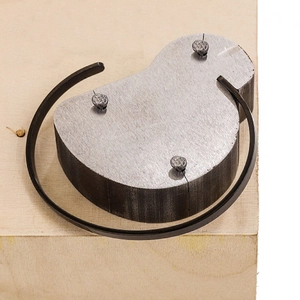 Industrial calabash shaped metal die cutting mold on wooden block for leather craft