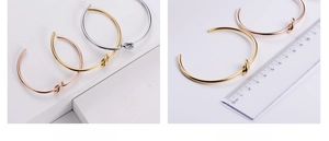 Detailed size measurement of minimalist knot bangles in gold, silver, and rose gold finishes
