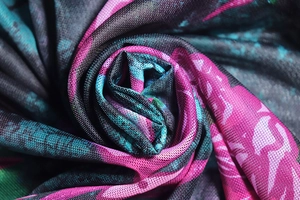 Detailed macro view of the breathable mesh fabric with elegant multi-color floral patterns