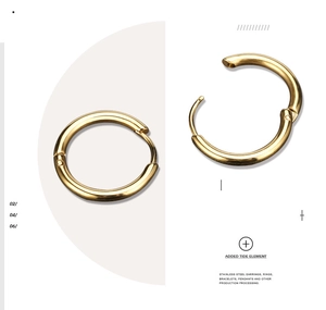 Macro detail of gold stainless steel hoop earrings showing open and closed mechanism