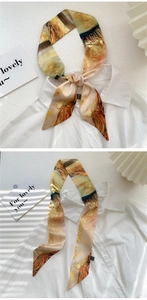 Macro detail of oil painting style silk scarf showing knotting styles and abstract patterns
