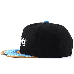 Detail of the unique donut brim snapback hat featuring a bite-mark notch and embroidery