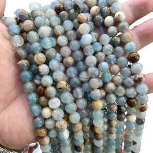 Natural blue calcite round beads with brown textures for DIY jewelry and bracelets