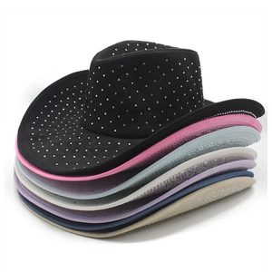 Close-up of stacked faux suede cowboy hats featuring sparkling rhinestones and diverse colors