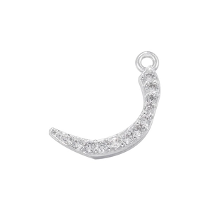 Macro shot of silver crescent moon pendant with inlaid zircon stones and ring clasp