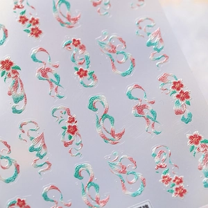 3D embossed floral nail stickers featuring red cherry blossoms and elegant silk ribbons