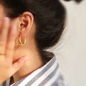 Minimalist gold U-shaped chunky hoop earrings with high-polish finish for women