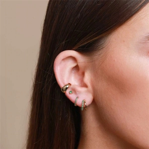 S925 silver gold-plated double hoop earrings with green zircon stones on model ear