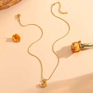 Gold stainless steel snake chain necklace with sparkling crescent moon pendant
